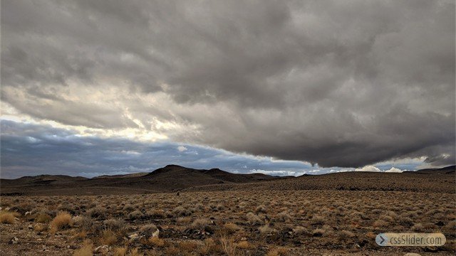 Storm Cell and Hills by Emma Ruppell